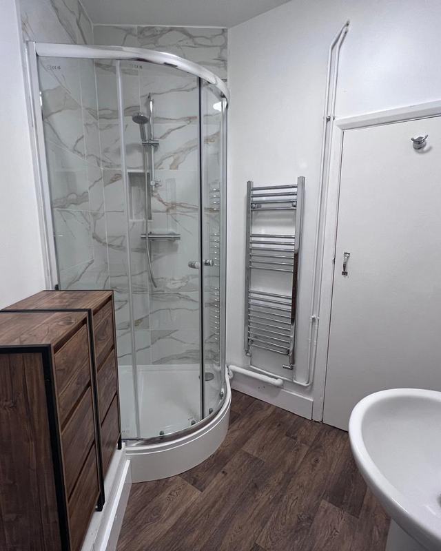 Bath removed for a corner shower, The Dials