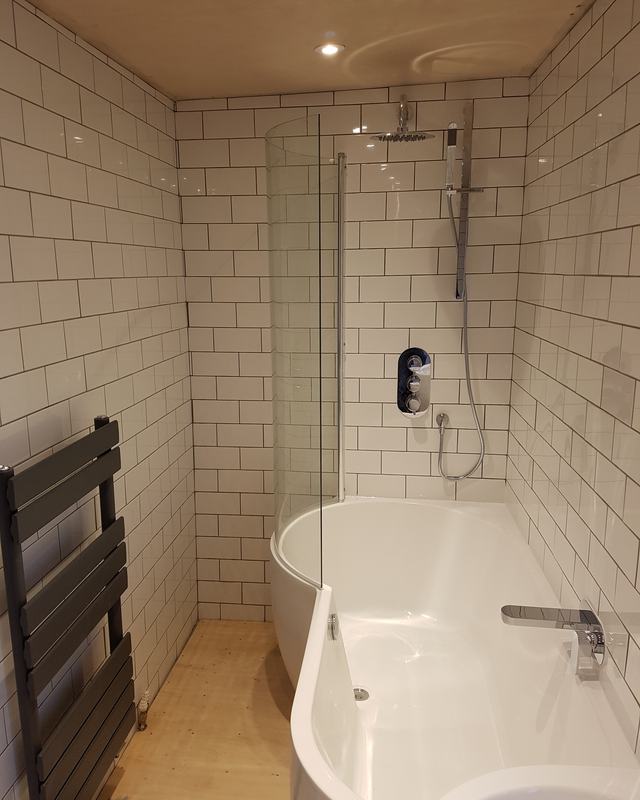 Metro tiles and a curved bath, Shoreham